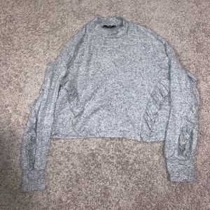 Small grey Bershka sweater! In great condition, gently used. Ruffle detailing